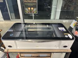 A photo of the Glowforge Pro Laser Cutter in the Makerspace.